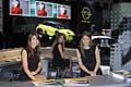 Ragazze al desk dello stand Opel all'ingresso principale del Salone di Bologna 2012